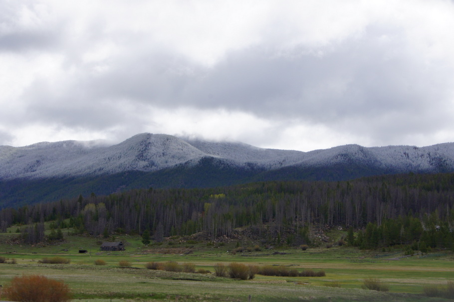Snow on the mountains between  Butte and Great Falls