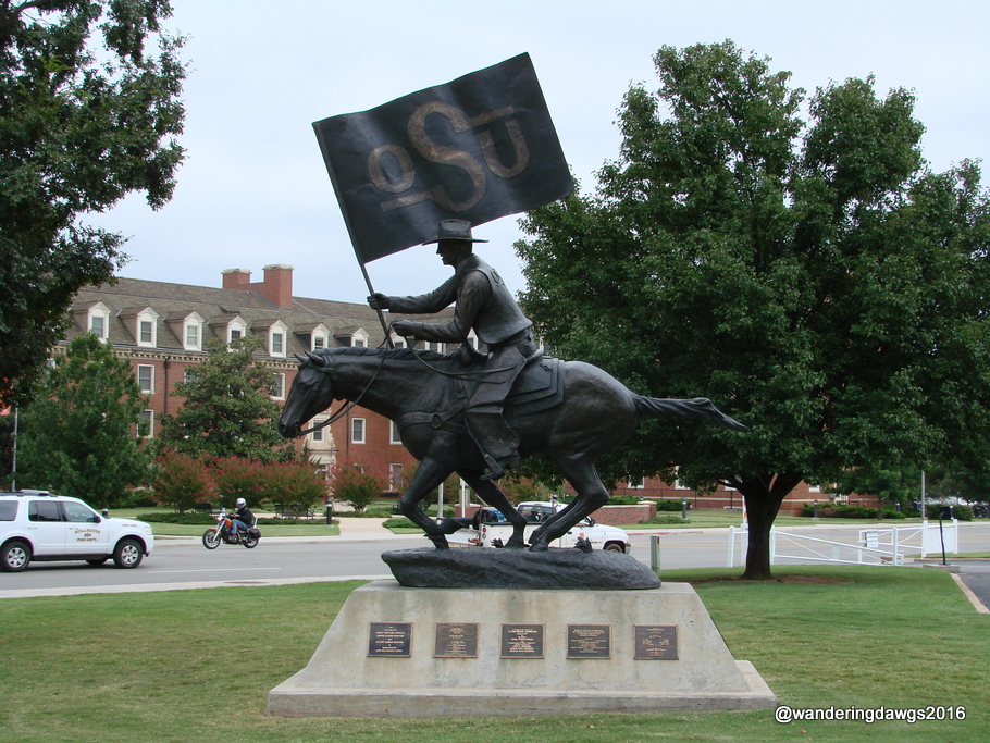 Oklahoma State University Cowboy with OSU Flag