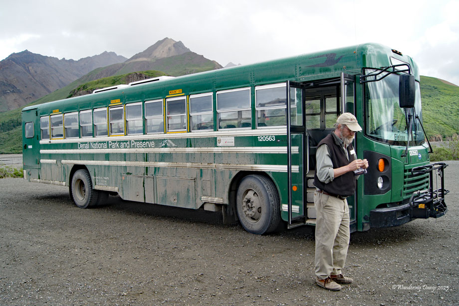 Our driver with the bus he drove on the road through the Denali Wilderness in Denali National Park, Alaska
